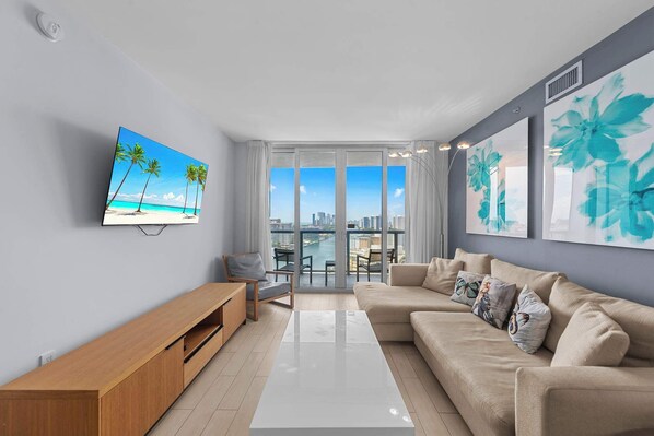From the living room, step onto the connecting balcony to enjoy waterfront panoramas and beautiful sunsets.