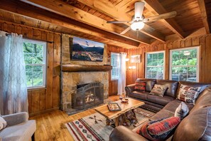 The living area is such a great place to unwind and have a fire and watch a football game!