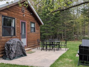 front entrance with outdoor dining on patio