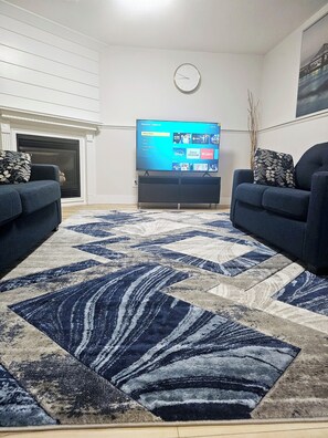 Living Room with Live Entertainment Roku Channels.