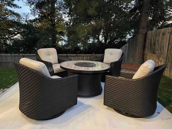 Patio set with fire pit.  We do not supply propane. Please bring own tank.  Propane tanks are Available at nearby stores.  