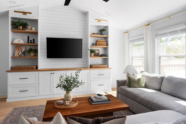Relaxation starts here with plush sofas and soft lighting. 🌿🕯️