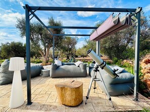 Dark skies - a telescope for you to view.
Comfortable outdoor sofas