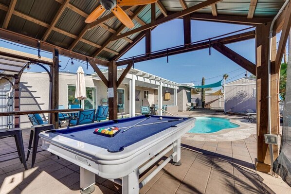 pool table in the shaded cabana