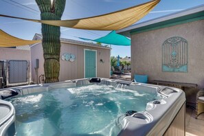 Relax and unwind in your private hot tub oasis