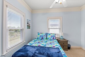 Comfortable Queen Bed: Perfect for restful sleep after a day of adventure.