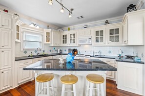 Large countertops and an island for easy cooking and entertaining.