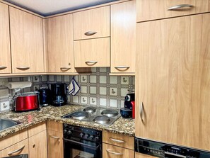 Kitchen Appliance, Kitchen, Major Appliance, Countertop, Wood, Cabinetry, Flooring, Home Appliance, Interior Design, Small Appliance