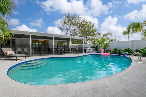 Make a splash with floaties and basketball hoops by the pool, perfect for endless fun and games.