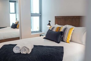 Bedroom 1 - Queen Bed (A/C + Ceiling fan)