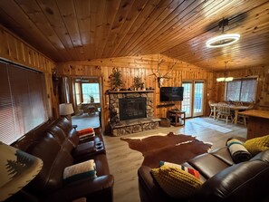 Living Room Looking Into The Den And Dining Room
French Doors Lead  To Back Deck