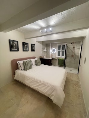 The light and airy white bedroom.