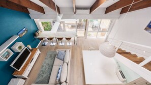 Another view of the living room, downstairs dining area 