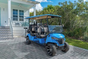 Zip around 30A in style with Symphony's included 6 seater golf cart!