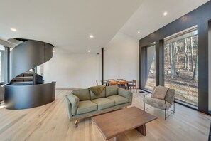 Living Area | Wood-Burning Fireplace | 1st Floor