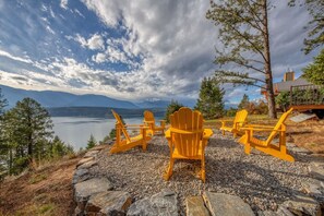 Epic lake & mountain views from the dedicated fire pit area in the backyard.