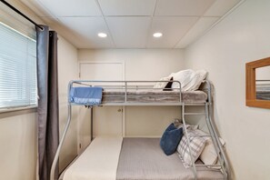 Twin over full. Door behind bunk bed is non-functional & locked from both sides.