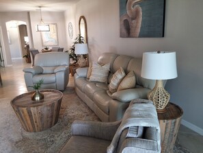 Comfortable living room allows you to kick your feet up and relax!