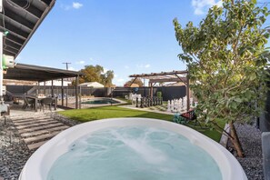 Backyard Oasis with giant chess and ping pong to enjoy under the stars