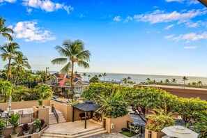 Experience island living at Kona Pacific A306, a 1-bedroom plus bonus room, 2-bathroom condo with a very nice ocean view.