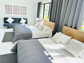 The sofa in the main room sleeps 2 minors comfortably. Bed sheets are provided.