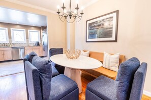 The dining room table is one of many gathering places in the home.