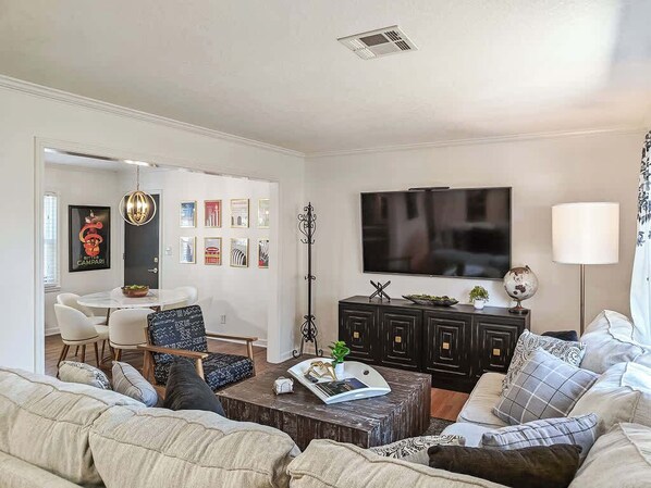 Living Room. 75" Smart TV to enjoy the game or movie