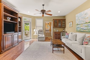 This gorgeous den is perfect for a movie night with the family!