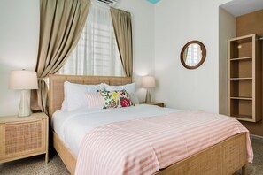 Simplicity meets comfort in this minimalist bedroom, designed for ultimate relaxation.
