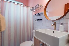 Step into this bright and spacious bathroom, your perfect oasis for unwinding.