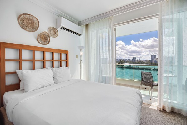 Wake up to the soothing sound of the waves, with your bedroom just a step away from the beach view balcony.