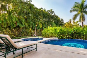 Have your morning coffee in the jacuzzi, surrounded by lush gardens, as the sun rises