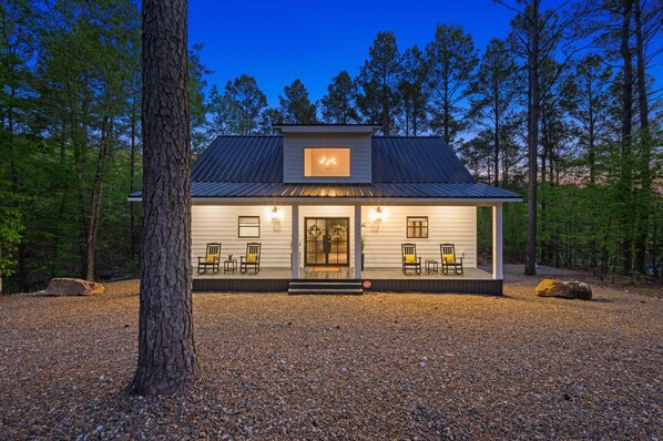 Adorable front porch with rocking chairs.