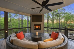 Ample seating on back deck perfect for cozying up by the fire.