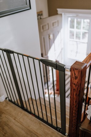 Baby gate at top of stairs
