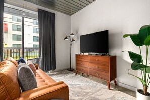 Experience true comfort in this cozy living area with a smart TV.