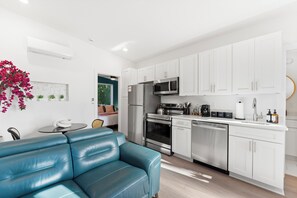 Fully Equipped Kitchen: Cook with ease in this modern kitchen, complete with all the essentials you need—everything from cookware to appliances, designed to make meal prep a breeze!