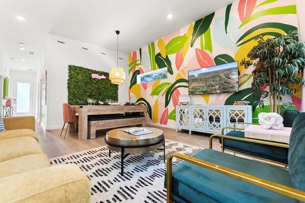 Enjoy seamless living in this open-concept space, where the kitchen, living room, and dining room flow together, creating a perfect atmosphere for entertaining and everyday living.