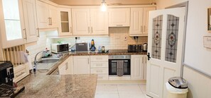 Passage East Co Waterford. Family Holiday home close to Ferry. Modern kitchen bright kitchen.