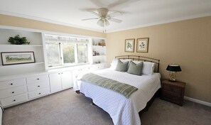 King bedroom with wooded views