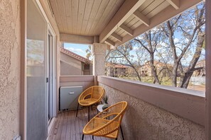 Lounge the day away in the fresh air on the shaded balcony
