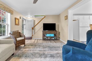 Curl up in the homey living room & stream all your favorite entertainment