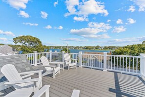 Breath in the fresh air on the large rooftop deck with outdoor seating