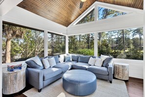 Embrace captivating lagoon vistas amidst lush greenery and wooded views of the Country Club Golf Course.