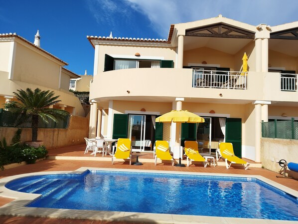 2-Bedroom semi-detached, split-level villa has private pool, parking & sea view