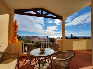 Inviting veranda to relax and enjoy the blue skies and sea view!