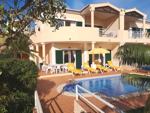 Super 2-bedroom semi-detached split-level villa with private pool and garden