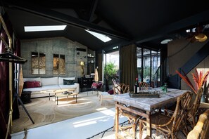 The living room and its dining area.