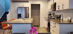Fully equipped Kitchen with electric stove, oven, Keurig coffee machine
