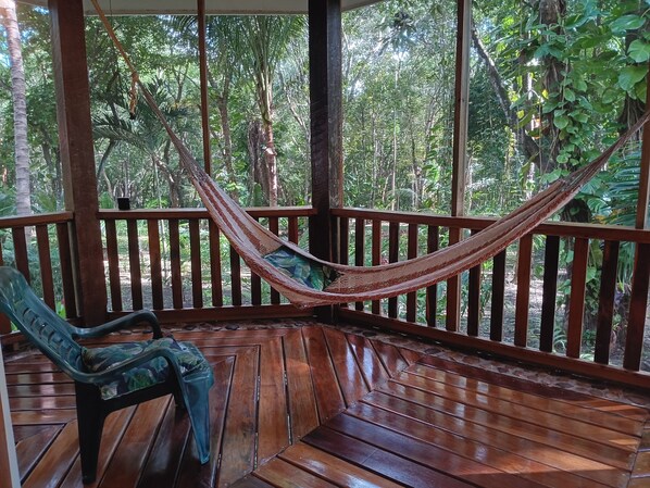 Private screened veranda overlooking the peaceful jungle.
